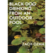 Black Dog Drinking from an Outdoor Pool