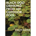 Black Dog Drinking from an Outdoor Pool
